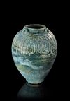 A LARGE UMAYYAD TURQUOISE-GREEN GLAZED JAR, MESOPOTAMIA, 7TH-8TH CENTURY