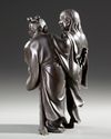 A FINE JAPANESE BRONZE OBJECT 置物 DEPICTING KANZAN 寒山 (HANSHAN) AND JITTOKU 拾得 (SHIDE), MEIJI PERIOD (1868-1912)