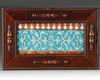 An islamic Iznik turquoise tile