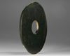 A NEOLITHIC JADE BI DISC, CHINA