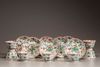 Seven sets of famille verte cups and saucers
