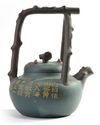A MASSIVE CHINESE GREEN CLAY TEAPOT, 19TH-20TH CENTURY