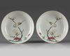 A pair of Chinese famille rose ruby-back 'bird and flower' dishes