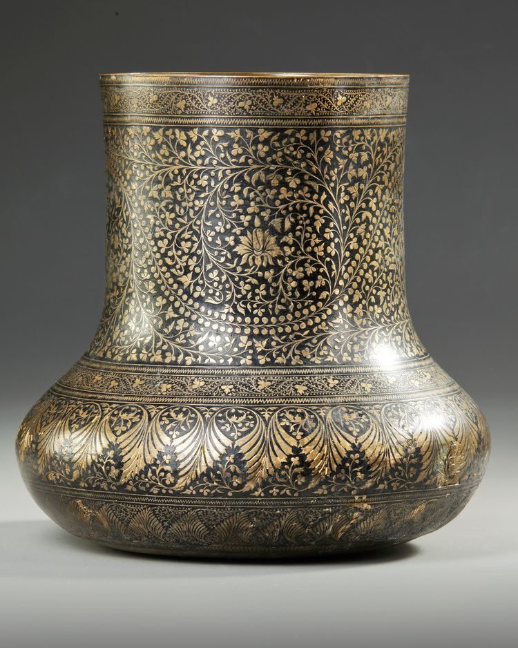 A GILT INDIAN BRONZE BADAYA, INDIA, 19TH-20TH CENTURY