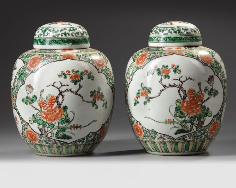 A PAIR OF CHINESE FAMILLE VERTE GINGER JARS AND COVERS