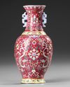 A CHINESE FAMILLE ROSE RUBY-GROUND WALL VASE, 20TH CENTURY