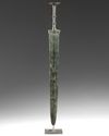 A Chinese inscribed bronze sword