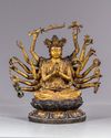 A MULTI-ARMED GILT CHINESE BRONZE FIGURE OF GUANYIN