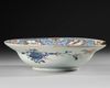 A CHINESE FAMILLE VERTE ‘PROVINCES’ ARMORIAL SHAVING BOWL, WITH THE ARMS OF GELDERLAND, CIRCA 1720
