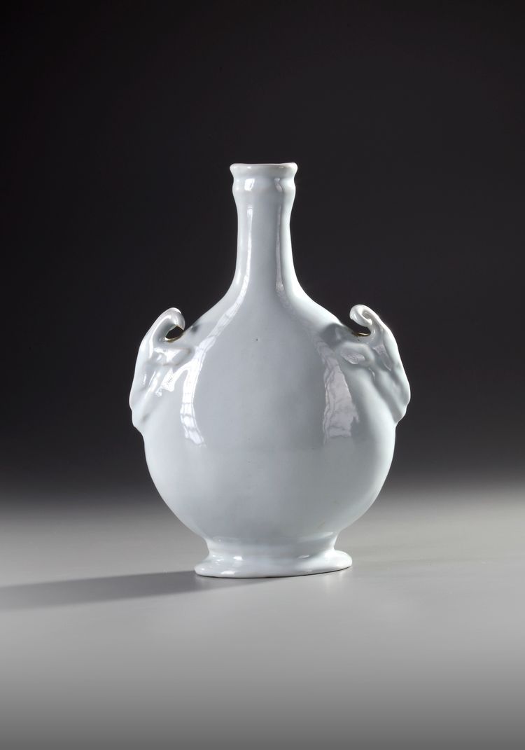 A FRENCH FAIENCE PILGRIM'S FLASK WITH RAM'S HEADS, 17-18TH CENTURY