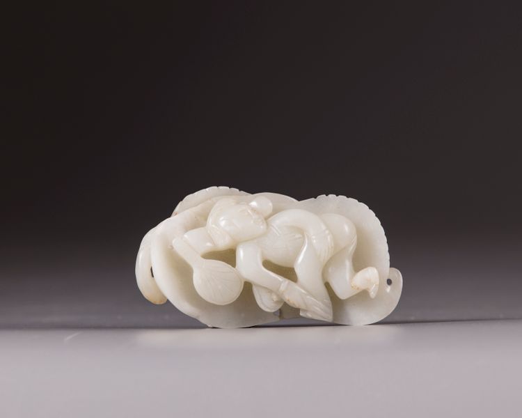 A Chinese white jade lady on a leaf