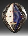 AN AFRICAN MASK, 20TH CENTURY