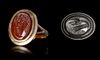 A CARNELIAN ROMAN INTAGLIO OF AN EAGLE'S HEAD, 1ST CENTURY AD