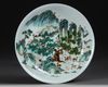 A CHINESE FAMILLE VERTE HUNDRED DEER DISH, 19TH/20TH CENTURY