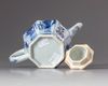 A blue and white hexagonal teapot and cover