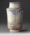 A KASHAN POTTERY ALBARELLO, PERSIA 13TH CENTURY