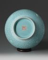 A Chinese turquoise-ground slip-decorated bottle vase