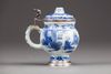 A Chinese blue and white mustard pot with European silver mounts