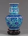 A Chinese gasoline green ground blue and white vase