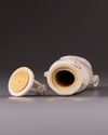 A Chinese ivory ‘chilong’ vase and cover