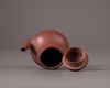 A Chinese yixing teapot and cover