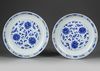 A PAIR OF CHINESE BLUE AND WHITE 'LOTUS' DISHES, 19TH-20TH CENTURY