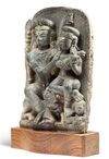A NORTH-INDIAN SANDSTONE CARVING OF SHIVA AND PARVATI