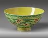 A Chinese yellow and green-enamelled 'bat' bowl with polychrome details