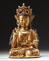 A  Chinese gilt-bronze figure of Avalokitesvara