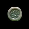 A FATIMID GLASS WEIGHT OF DOUBLE DIRHAM , AL-MUSTANSIR BI-ALLAH (AH 427-487 / 1036-1094 AD)