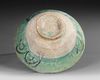 A KASHAN TURQUOISE AND BLACK POTTERY BOWL, PERSIA, 12TH-13TH CENTURY