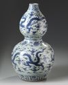 A CHINESE BLUE AND WHITE DOUBLE GOURD VASE, MING DYNASTY (1368-1644) OR LATER