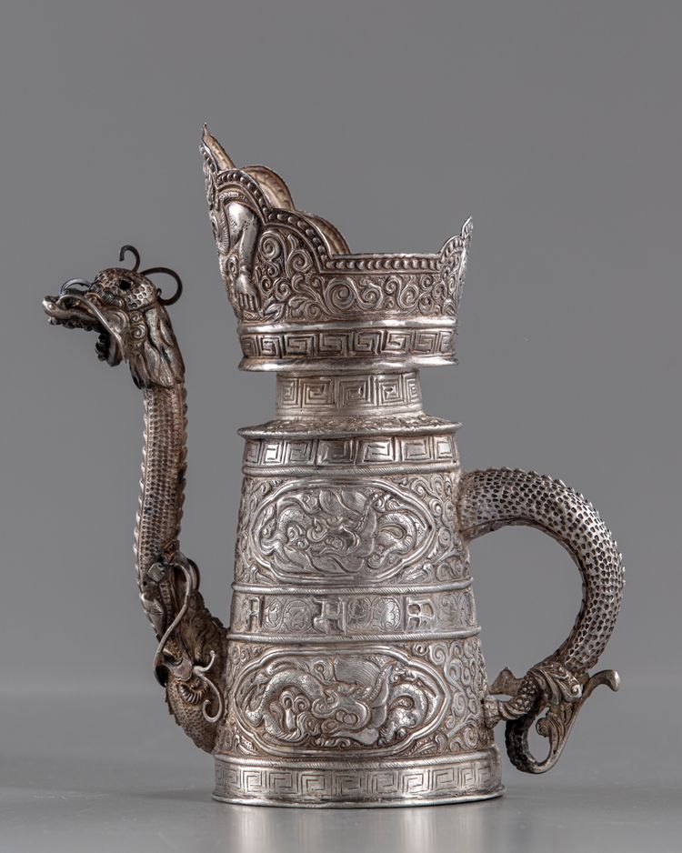 A TIBETAN RITUAL SILVER EWER, 19TH CENTURY