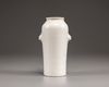 A Chinese Dehua white-glazed slender vase