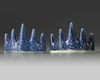 A pair of Chinese blue glazed 'mountain' brush rests