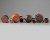 Three Chinese Yixing teapots and a Yixing brush pot