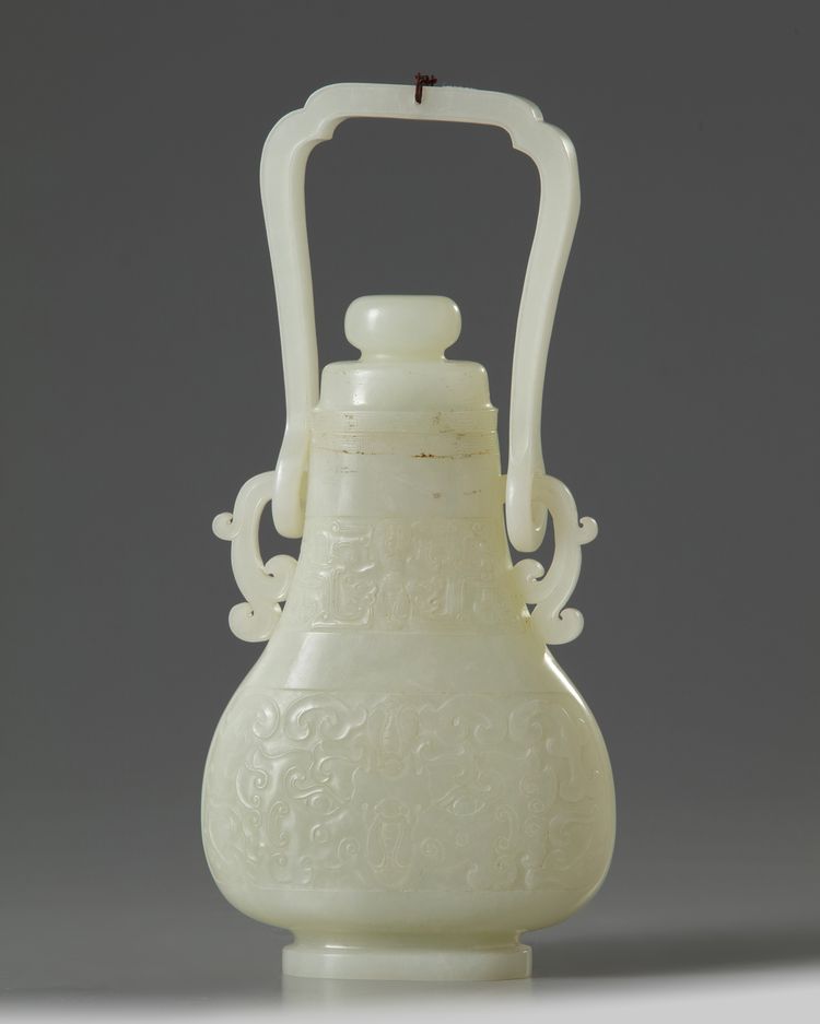 A CHINESE WHITE JADE HANGING VASE AND COVER, QING DYNASTY (1644-1911)