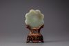A celadon jade floral plaque