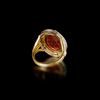 A ROMAN PORTRAIT INTAGLIO OF 'AELIUS' 2ND CENTURY AD, MOUNTED IN A 20 CENTURY GOLD RING, 18K WITH DIAMOND