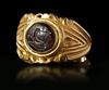 A ROMAN GOLD RING WITH DARK GREEN JASPER INTAGLIO, CIRCA 3RD-4TH CENTURY A.D.
