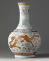A Chinese famille rose 'dragon' bottle vase