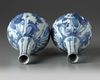 Two Chinese blue and white 'Kraak porcelain' bottle vases