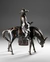 A CHINESE BRONZE FIGURE OF A SCHOLAR RIDING A DONKEY,19TH CENTURY