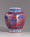 A Chinese octagonal deep red and blue jar