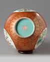 A Chinese coral-ground famille rose 'qilin' vase