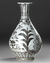 A CHINESE COPPER-RED PEAR-SHAPED VASE, QING DYNASTY (1644-1911)