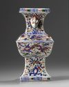 A Chinese wucai square-section dragon and phoenix' vase, zun