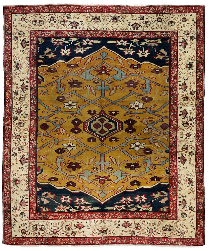 A VERY FINE AGRA RUG