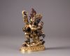 A Sino-Tibetan gilt bronze figure of Sadbhuja Mahakala