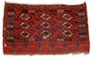 AN ANTIQUE TURKMEN KIZILAYAK CHUVAL (LARGE TENT BAG)